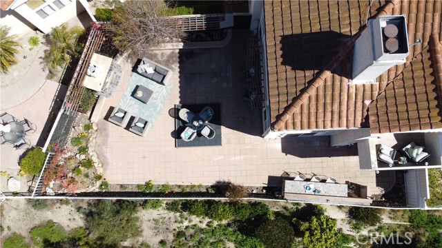 Drone perspective of your huge, private backyard with ocean views.