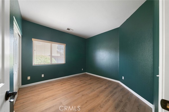 Another spacious guest bedroom with closet