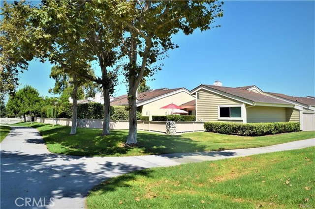 8 Creekwood 71 Irvine, California What a beautiful home for you and your family to enjoy the Irvine Woodbridge community. Spacious living room anchored with a cozy fireplace, completely remodeled kitchen overlooks the dining area and living room. 2 large bedroom suites for quiet and privacy. Oversize garage adjacent to the kitchen for convenience. Don't forget to step out to the back patio yard to appreciate nature. The entire house is light and bright which will bring ample energy and tranquility. The State-of-the-art Woodbridge community is a model of planned development in the nation. Award-winning schools and easy access to shopping and recreation facilities just some of the few reasons what you should check out this house to call it home-sweet-home.