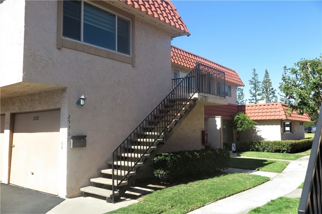 25367 Via Verde 4 Lake Forest, California Light and Bright end carriage unit above it's own garage with nobody above or below! Enter through the front gated front balcony that overlooks a greenbelt, into this bright upper unit with 2 bedrooms and 1 bath with jacuzzi tub. Offering easy to clean manufactured wood floors throughout all rooms except the master which has brand new carpet, custom window coverings throughout and dual toned paint. Eat in kitchen offers granite counters, breakfast bar, newer appliances, plenty of cabinet space, closet for a full sized washer & dryer and the eat in dining area complete with sliding glass doors that lead to a stairway down to large enclosed & paved patio/yard! Master offers new carpet, ceiling fan, mirrored closet doors and direct access to the bathroom. Bath has newer cabinets, lights and fixtures plus a jacuzzi tub! One car garage located directly beneath, plus one assigned space (#367 in front of the pool). Great community with lots of grass and and greenbelt, plus pool and spa, and just minutes to 1-5 for easy commuting!