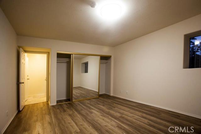 Bedroom 2 on middle floor is large. New laminate flooring and lighting.