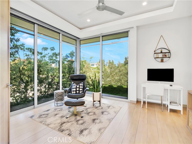 4th Bedroom with glass doors and pastoral views.
