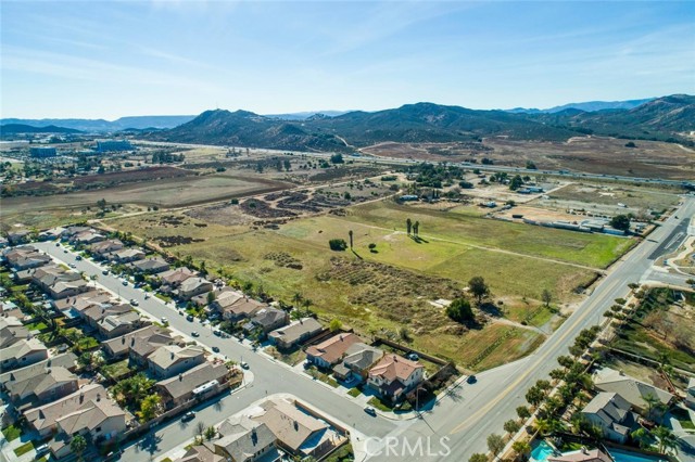 Future sight of the new City Of Murrieta Mapleton intersection! Multiple Potential uses! Vacant Commercial land just under 5 acres on Keller Road in the Murrieta Highlands. Development opportunities endless!