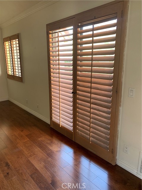 Custom wood shutters on Slider to Patio