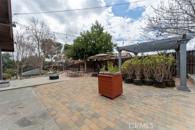 West side of home great for relaxing next to garden and fruit trees!