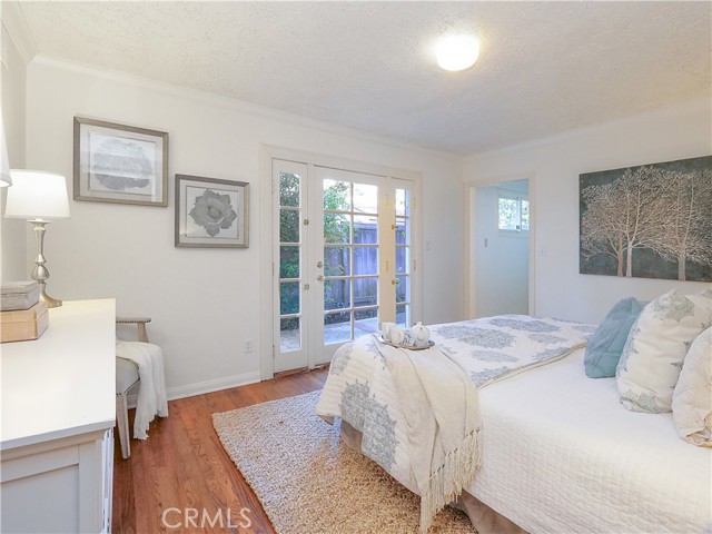 Primary bedroom with French doors to patio