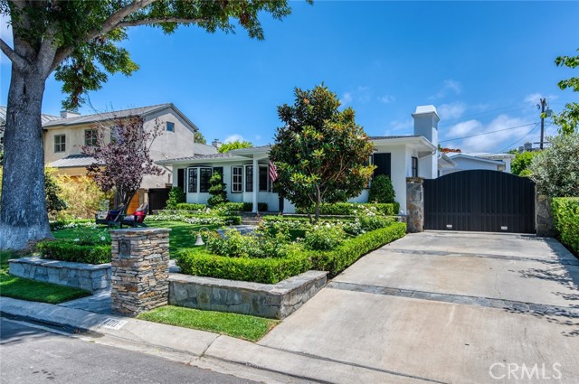 Set in the highly sought-after neighborhood of Cliffhaven in Newport Beach, this turnkey residence was designed to foster luxury California living. Introducing the delights within are manicured lawns, a picturesque stone pathway, and quintessential Dutch doors. Inside, light-infused spaces flow seamlessly to gracious outdoor entertaining vignettes of the three-bedroom, three-bathroom home. Chefs and entertainers will appreciate the open-plan gourmet kitchen characterized by quartz countertops, Viking and SubZero appliances, custom backsplashes, and custom cabinetry. Further along, the sumptuous living room is perfect for grand-scale gatherings and is warmed by a granite-framed fireplace. Accessible by an array of French doors, the private backyard is an entertainer's delight encased by mature greenery and offers a spa, pizza oven, beverage fridge, two burners, multiple al fresco lounging and dining areas, and a dramatic stone fireplace for year-round enjoyment. Further along, a generously sized detached studio with a 3/4 bath is an idyllic space for overnight guests or an in-law suite. Additional highlights include hardwood flooring, crown molding, built-in work stations in every bedroom. and a detached two-car garage featuring epoxy flooring and built-in storage. Situated in an award-winning school district just moments to five star resorts, championship golf courses, Lido Marina village, Fashion Island, and famous beaches, this address is an exceptional offering.