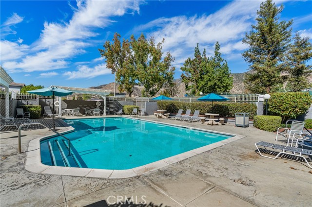 Sparkling Community Pool and Sitting Areas