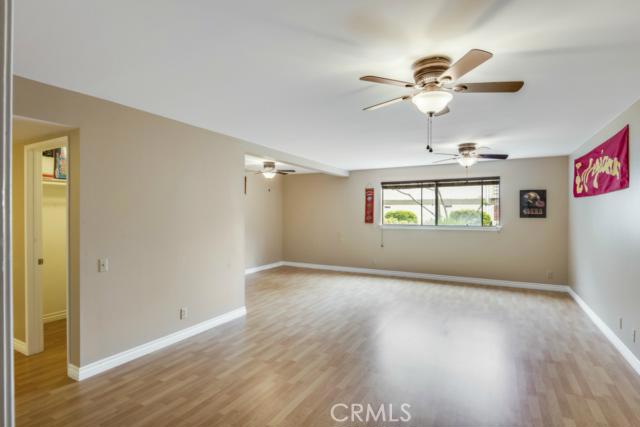 This is a very large room on the ground level. There is a large closet and a 3/4 bath. Down the hall is direct access to a 3 car garage and no steps into this room.  Could be used as a bedroom, or large kids rumpus room, or perhaps the Man Cave...