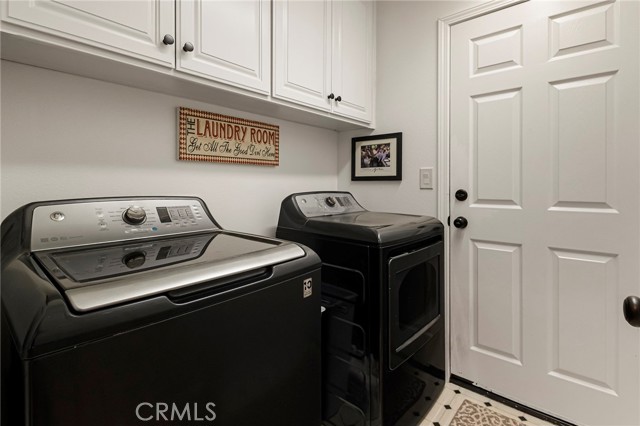 Indoor Laundry Room with garage access.