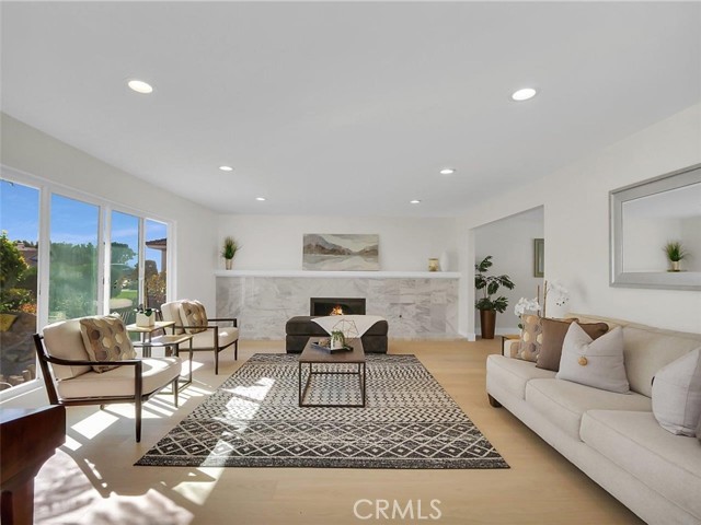 Living Room with Marble Fireplace