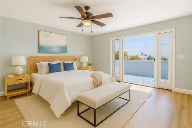Virtual staging of your primary bedroom with private balcony.