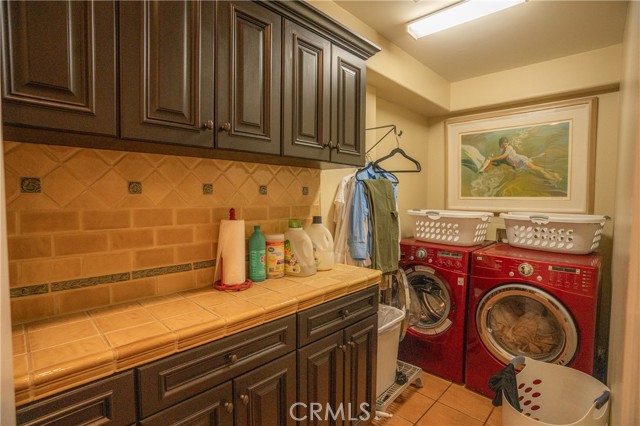 Large Laundry Room, with Countertop and Storage.  1st Floor.