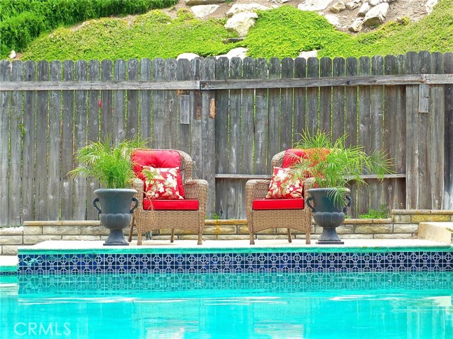 The back yard is an entertainers dream which includes a generous sized pool yet leaves plenty of room for guests to enjoy lawn games and other outdoor activities The back yard is an entertainers dream which includes a generous sized pool yet leaves plenty of room for guests to enjoy lawn games and other outdoor activities