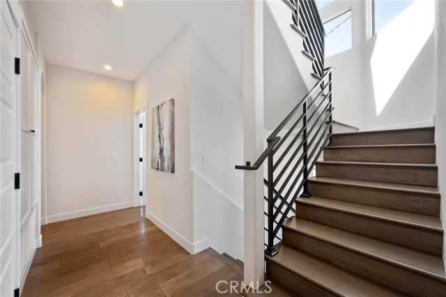 Sunlit stairways and hallways throughout the home.