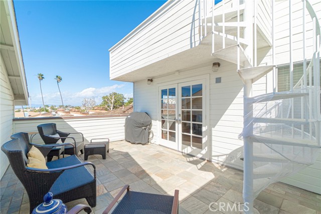 Patio/Deck just off the family room with fabulous sunsets and ocean views