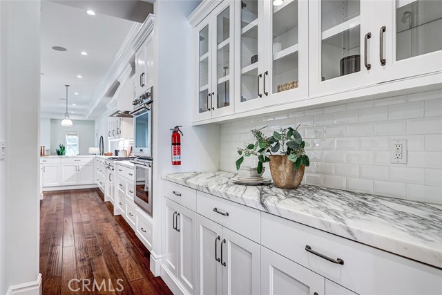 Butler's Pantry with Calacatta Marble Countertop and View to Kitchen