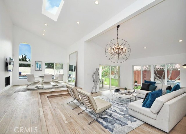 Sunken Living Room & Formal Dining Room with High Ceiling