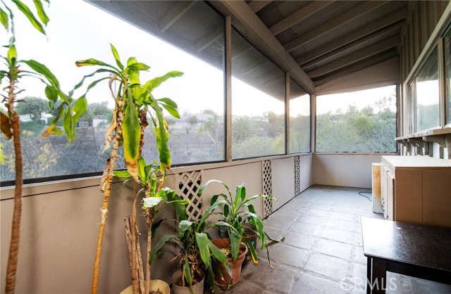 Screened porch off the dining area