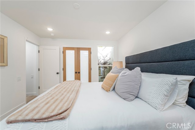 Large bedroom with lots of closet space and organizer, recessed lights in the room and in the closet as well as ceiling fan pre-wire.