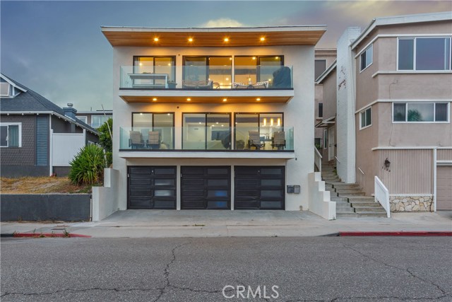 1126 Manhattan Avenue Hermosa Beach, California Gorgeous Ocean View only steps from the beautiful Hermosa Beach! This modern flare property is built with 3 car garages on ground floor. 2nd level has a wonderful layout apartment offering 3 bedrooms, 2 full baths, open living, dining, and kitchen area with a balcony across the entire apartment facing ocean views. 3rd level apartment is also a 3 bedroom, 2 bath, open concept living, dining, and kitchen area. Set out on your indoor outdoor balcony to watch a beautiful sunset every evening.
This building's exterior and interior has been recently undated with stainless steel appliances, recess lighting throughout, new updated bathrooms, paint, cabinetry, countertops and flooring. Exterior has been newly Stuccoed, exterior paint, and all new Fleetwood sliding doors and windows. The entry into both apartments has an new exterior modern door with lock pad leading into secure private stairway to your own private front door.
Only minutes walking steps to the Hermosa Beach's famous Pier Ave. Best shopping, restaurants, and the beautiful Hermosa beach. Come see for yourself this relaxing and exciting beach town living!