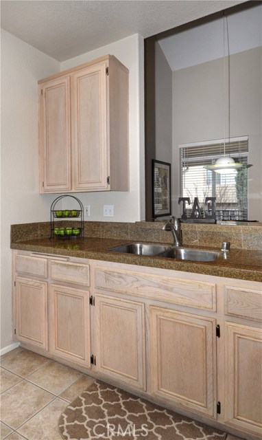 Another view of kitchen.  Has lots of cabinets space.