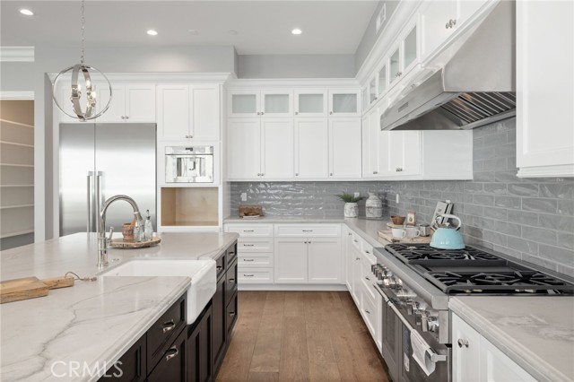 Extraordinary Kitchen, Custom Display Cabinetry, Natural Stone Counters, Top of the Line Appliances