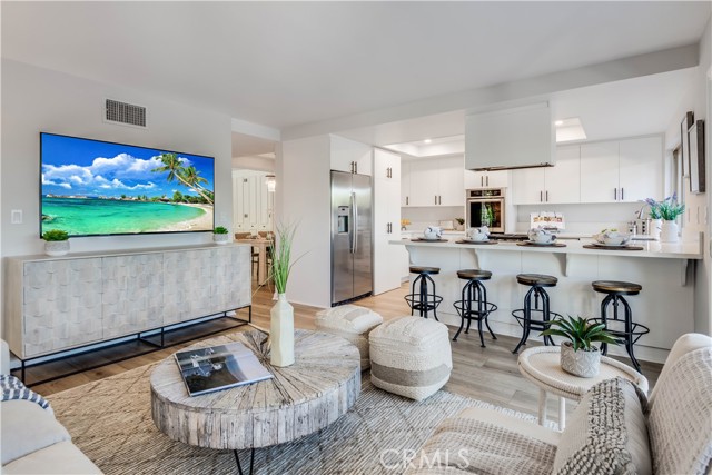Family room off kitchen with sliding glass door to a private patio Family room off kitchen with sliding glass door to a private patio