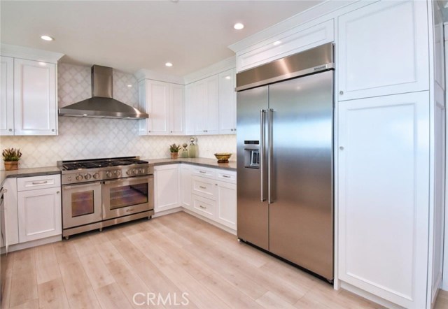 Brand new stainless steel appliances with a built-in refrigerator
