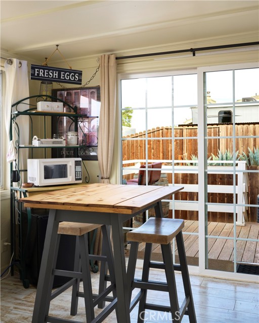 Air BnB lounge with views of the vineyards and hills.  Perfect for that morning cup of coffee, access to outdoor deck and fenced backyard