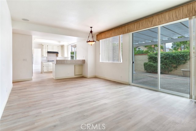 Family Room, Breakfast Nook and Kitchen. Beautiful New Sliding Door leads to Private Backyard