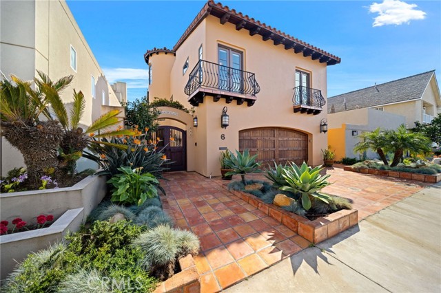 Entrance, 2 car garage, driveway.