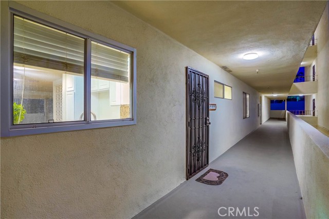 Common area hallway to unit. Common area hallway to unit.