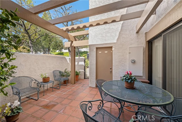 Front Patio toward Garage & Entry Gate