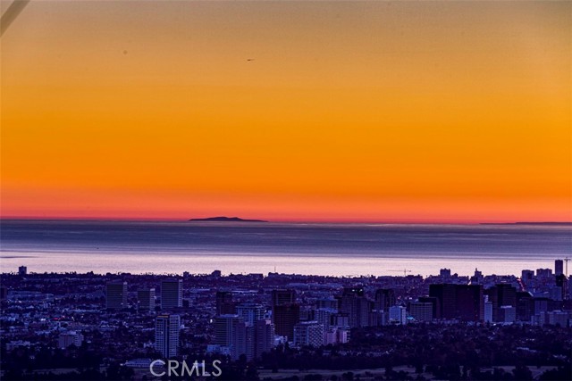 2287 Sunset Plaza Drive Los Angeles, California Spectacular unobstructed panoramic views of the City the Ocean and Catalina Island from every room in the house. This breathtaking meticulous contemporary home offers 5 bedrooms and 5 1/4 Bathrooms. A stunning indoor/outdoor pool with incredible views. The master bedroom encompasses the entire upper level with amazing jetliner views of the Pacific Ocean. The lower level includes an in-law/guest quarters fully equipped apartment with it's own separate entry if needed. Simply put an AMAZING PROPERTY!