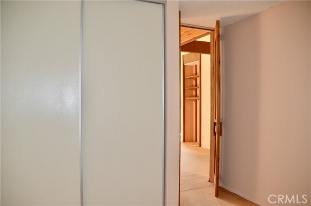 Lower bedroom has double closets.