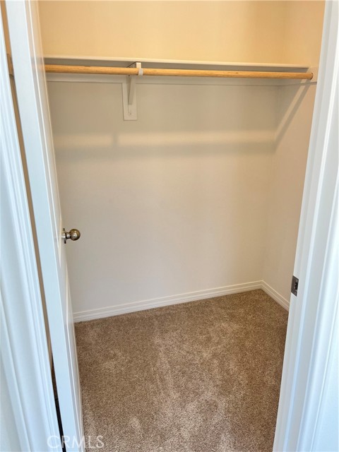 First bedroom walk in closet