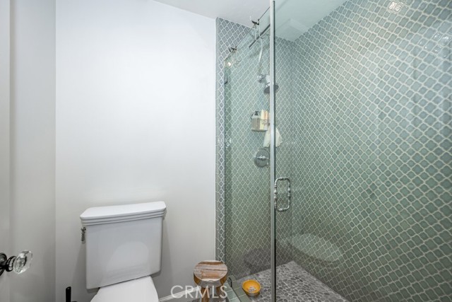 View of primary suite toilet & shower room