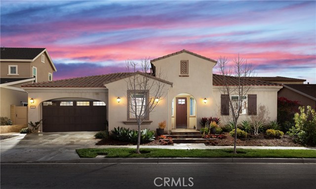 122 Stizza Irvine, California **SINGLE LEVEL** PRICED TO SELL!** A beautifully upgraded home located within Pavilion Park, the first Great Park Neighborhood in Irvine, this single story gem looks like a model! Enjoy the comforts of this spacious floor plan that offers stylish upgraded features such as a gourmet kitchen with slab granite counter tops, large island with eating bar, beautiful cabinetry, stainless appliances including the refrigerator, designer ceramic tile flooring throughout, large master suite with a walk-in closet, great room, and a spectacular backyard porch. This home also features an array of energy saving features including solar panels. With homes located along lovely streets lined with reclaimed heritage trees and surrounded by nature, Pavilion Park has been designed for an active lifestyle of walking, jogging and biking. The neighborhood is in the award-winning Irvine Unified School District's newest and highly sought-after Portola High School. Residents will be able to take advantage of all of the wonderful amenities that the Great Park Neighborhoods has to offer such as pools, playgrounds, BBQs, basketball courts, clubhouses, community greenhouse, art center, sand volleyball courts, trails, a newly constructed ice-rink arena, soccer fields, and more! Come live a resort-style life in one of Orange County's newest and most popular communities! Welcome Home!