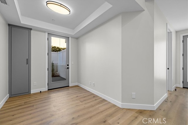 first floor sitting area with door to back patio