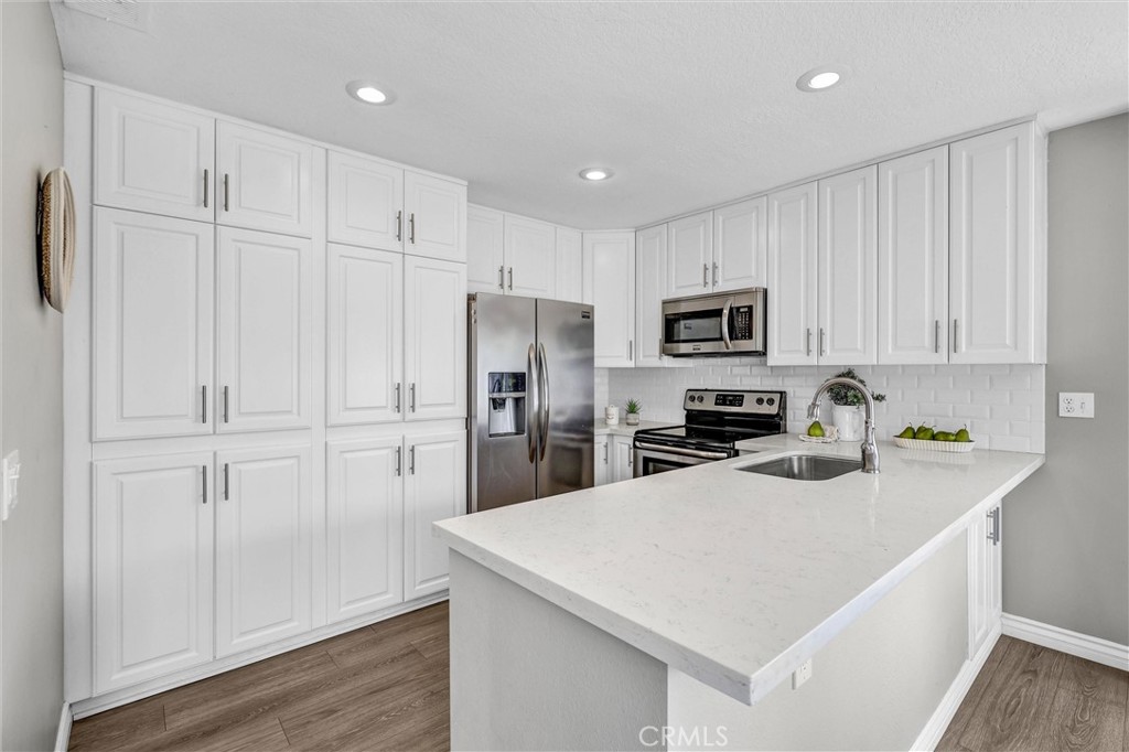 Welcome to 25 Brighton Place, where Sophistication, Comfort, and Convenience converge in the heart of Laguna Niguel’s Beacon Hill!

Step inside and be captivated by the meticulous attention to detail that defines this true gem. Boasting a blue water ocean view, spacious interior, elegant finishes, and an abundance of natural light, every corner of this home exudes beachy comfort and warmth. Enjoy a gourmet kitchen equipped with stainless steel appliances, sprawling stone countertops, and plenty of cabinetry, perfect for culinary enthusiasts and entertaining guests.

Unwind in the serene master suite, complete with a lavish en-suite bath featuring dual vanities and a soaking tub—your private oasis to relax after a long day. Additional bedroom offers comfort and privacy, making this home ideal for families or guests. 
Step outside to discover your personal outdoor retreat, where beautiful landscaping invites you to savor intimate evenings al fresco or host gatherings with friends and family under the California sky.

Centrally located, you'll find yourself just minutes away from premier shopping destinations, gourmet dining, and chic entertainment options in Laguna Niguel and the greater Orange County area. Revel in the ease of access to the stunning beaches of the Pacific Coast, as well as accessible major freeways a close distance away. 

This community is ideally situated across the street from John S. Malcolm Elementary School and is a short distance to Ocean Ranch Park, which offers a playground and basketball courts. As a Beacon Hill resident, you will enjoy WORLD CLASS amenities, including 3 pools/spas, 6 tennis courts, and scenic walking paths, all covered by the HOA. 

Whether you're seeking a serene sanctuary or a vibrant lifestyle, 25 Brighton Place offers the perfect blend of tranquility and accessibility. Don’t miss your chance to live in one of Laguna Niguel's most sought-after neighborhoods, where exquisite living meets convenience. Schedule your private tour today and step into your dream home at this unparalleled address!