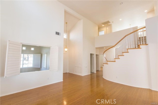 18450 Nottingham Lane Rowland Heights, California View! View! View! 180 degree view home at Vantage Pointe community with 3 rooms upstairs, one room and one bonus room downstairs. 3 full bath. Double door entry leads to magnificent high ceiling in living room and formal dining room. Bright & open floor plan with lots of large windows letting in abundant of natural lighting. Gourmet kitchen with center island, lots of cabinets storage space, and breakfast nook. Luxurious master suite with retreat, balcony overlooking the gorgeous view, fireplace and separate shower & soaking bath tub, large walk-in closet in master bath. Washer, dryer, refrigerator are provided but not under warranty. Conveniently located close to shopping center, park, community center, and easy access to 60/57 FWY