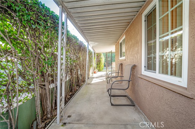 Wrap around patio cover, this leads to the back yard.