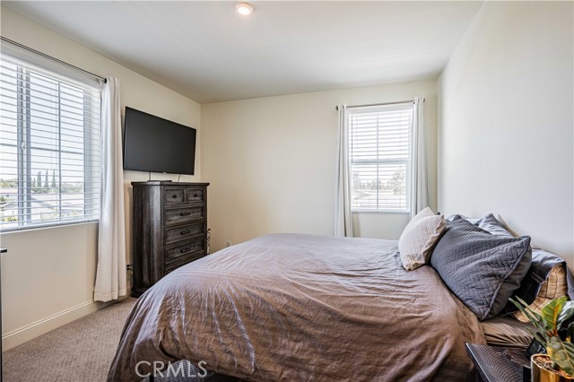 Fourth and final bedroom has burbor carpet, and features 2 windows that allow you to see the stallar views.