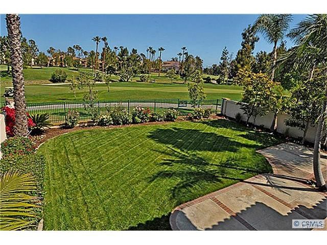 12130 S RIVIERA S Tustin, California Spectacular Tustin Ranch GOLF COURSE VIEW HOME in Desirable GATED MONTECITO* HUGE PRIVATE LOT, APX 9,000 SqFt* PANORAMIC VIEWS of the Golf Course (13th Fairway) and Hills* Gated Courtyard Entrance* Gorgeous NEW VINYL WOOD PLANK FLOORING, great for kids & pets* Living Room w/2-Story Ceilings & a Cozy Fireplace* Formal Dining Rm w/French Doors with Views of the Golf Course* Exquisite Turned Staircase* Gourmet Center Island Kitchen, Stainless Steel Appliances, Built-In Fridge, Double Ovens, Granite Counters, Full Back Splash and White Cabinets* Family Rm Fireplace, Wet Bar* MAIN FLOOR GUEST BEDROOM WITH FULL PRIVATE BATH* Separate Powder Room *Main Floor Separate Laundry Room *Master Suite Offers Beautiful Golf Course Views, a Retreat w/Fireplace and Balcony* Luxurious Master Bath with Tumbled Stone Counters, Frameless Shower Door, Oval Tub and Huge Walk-in Closet w/Organizers* Additional Large Bedrooms w/French Doors Lead to Covered Front Porch* Bonus Rm/5th BR * 3-Car Garage* Lovely Association POOL, Spa, BBQ, Tot Lot, Lighted Tennis Court Just Outside the Gates at Gallery Park* Walk to Award Winning Schools - Ladera Elementary, Pioneer Middle, Beckman High* Nearby Numerous Parks, Peter's Canyon Trails, Tustin Ranch Golf Course, Market Place Shops & Theaters*