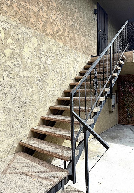 Stairs going up to the condo.