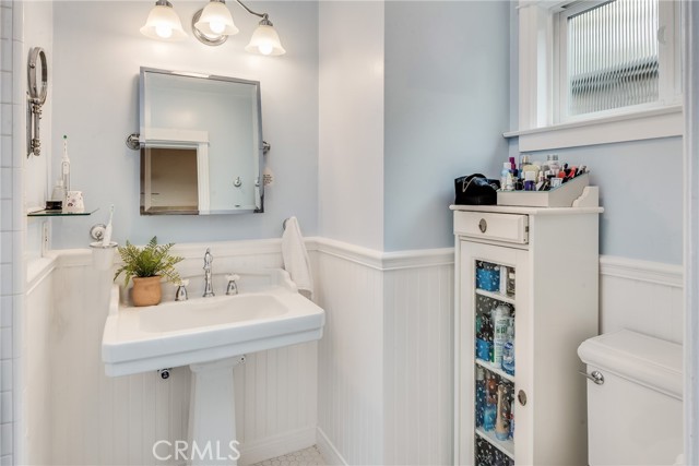 Primary bathroom offers a bright coastal inspired design