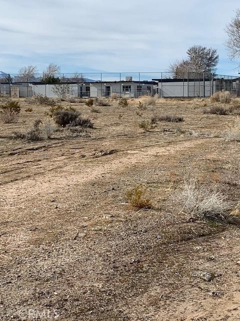 Property next door between PIQ and  High School