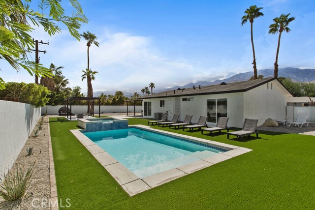 Looking for a fully updated pool home in the heart of Palm Springs with amazing views? HOW ABOUT AN INTEREST RATE IN THE 4's? Thats right, the seller is willing to substantially buy down your interest rate AND cover all your closing costs. With similar properties in this area grossing around 150k per year on Airbnb, the savings will tremendously boost your ROI if you are looking for your next investment opportunity. And for the full time occupant buyer just think about what you could do with all that extra savings each month. What more could you ask for? Well wait a minute, let me answer that, how about instant equity right from the start? With recent comps selling in the 1.4million-1.5million range ( see 2380 N San Antonio Rd, 2010 E ACACIA Rd, 2293 N Cerritos Rd) you have finally found that great deal you've been searching for. This home has been reimagined from top to bottom with a brand new open concept kitchen and living area. All new windows and sliders, brand new hvac, all new kitchen and appliances, new recessed lights, new bathrooms, new modern tile flooring, new landscape front and back with no maintenance artificial turf in the backyard, brand new ultra modern garage door, and best of all a brand new pool and spa. The home is situated on right about a quarter acre in one of Palm Springs most trendy neighborhoods, and offers close proximity to downtown, NO HOA, and NO land lease. Best of all this property can be sold turnkey furnished so you can start resort style living the moment you are handed the keys. ********