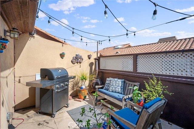 Private balcony adjacent to living room & primary bedroom